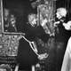 “Customers, left, scream while a volunteer psychopath steps on severed head and swings ax at victim in Halloween Haunted House for charity at Florence, Ky., Oct. 22, 1981.” Photo via AP Images.